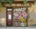 In centuries past, young Italians signed off on some of the greatest artworks the world has ever seen. Now, they sign off with scribbles on walls.  