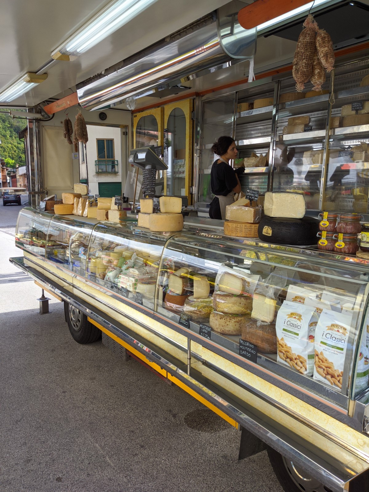 Cheese  stall at the market in Arsiero Cheese  stall at the market in Arsiero